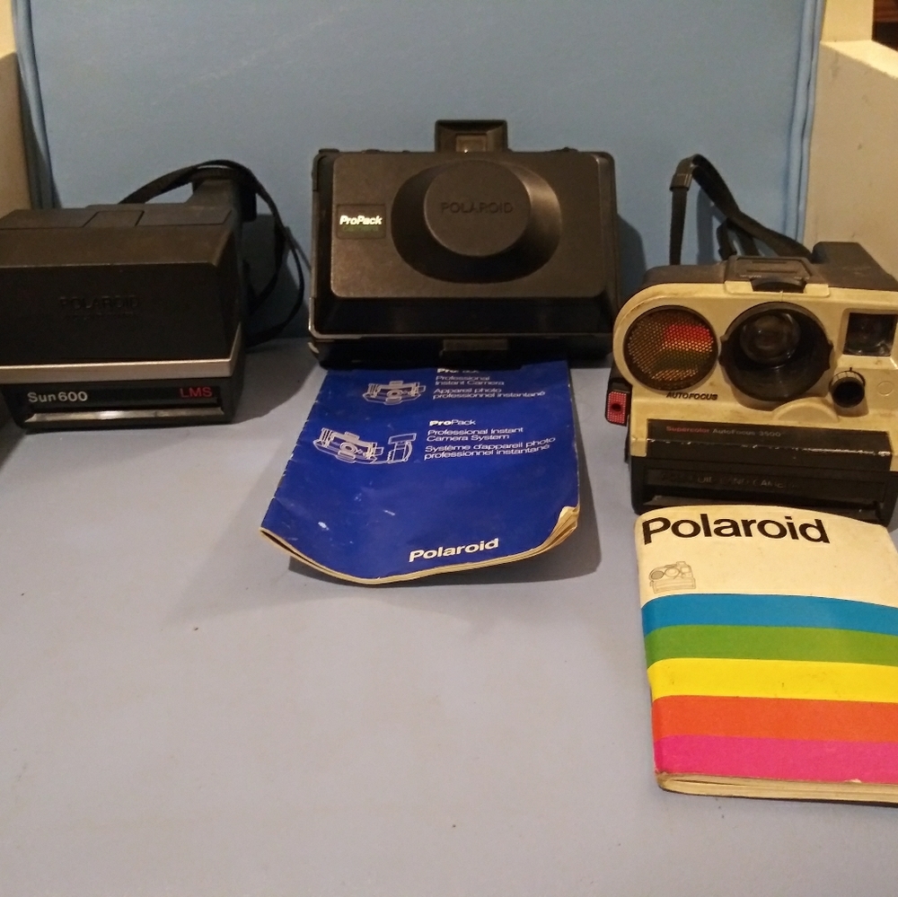 3 Vintage Polaroid Cameras